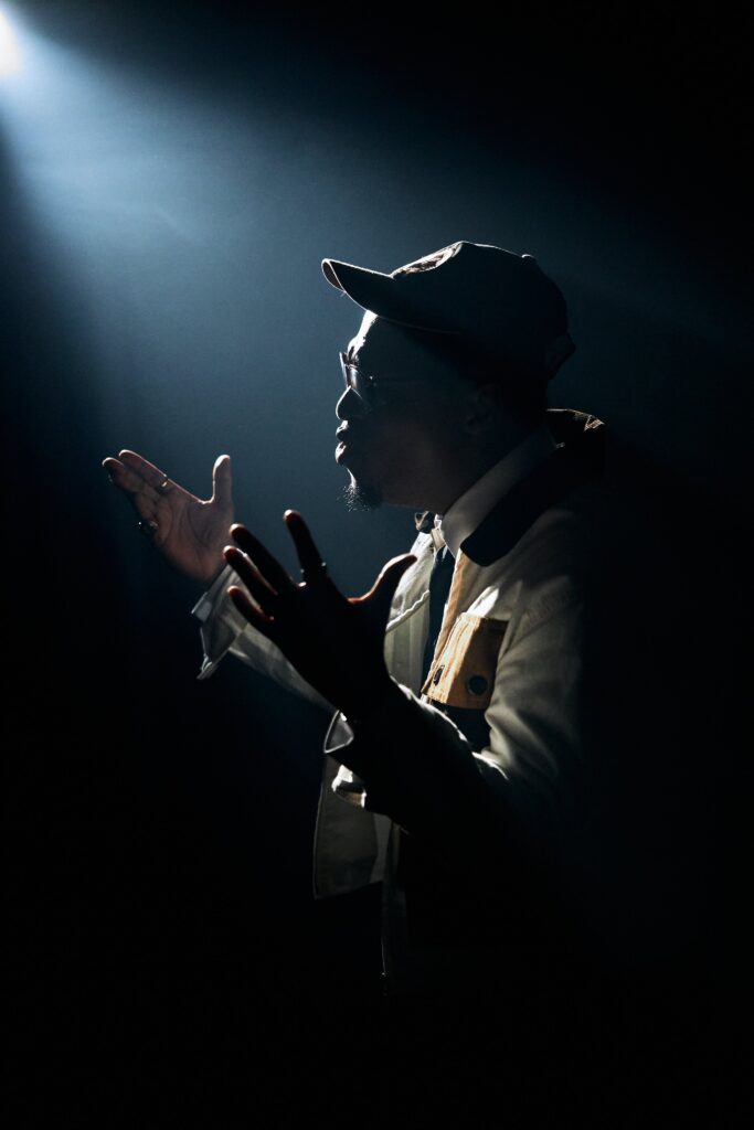 Rapper Ko-Jo Cue in a performance pose